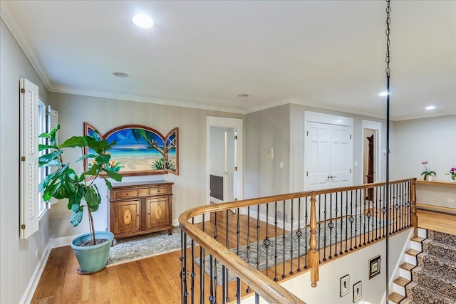1490 S Ridge Rd, Lake Forest, IL 60045 - hall with light wood-style flooring, recessed lighting, an upstairs landing, and crown molding
