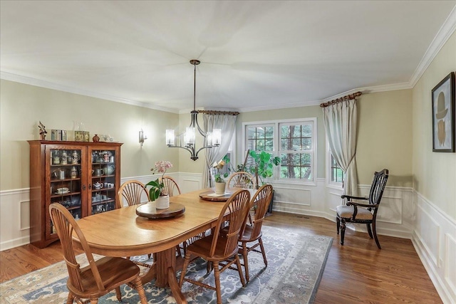 1490 S Ridge Rd, Lake Forest, IL 60045 - dining area featuring dark wood-style flooring, a wainscoted wall, a chandelier, a decorative wall, and crown molding