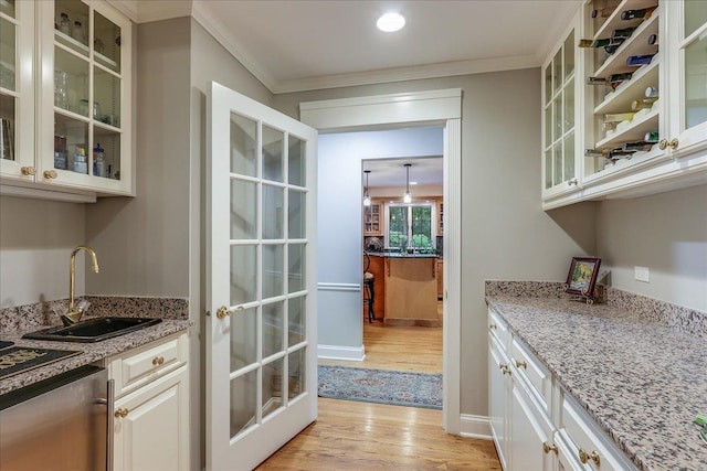 1490 S Ridge Rd, Lake Forest, IL 60045 - indoor wet bar with light wood finished floors, ornamental molding, and black electric stovetop