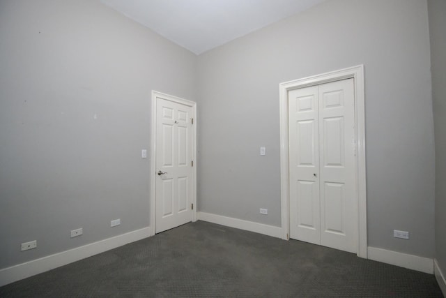 323 W Schiller St Unit 1W, Chicago, IL 60610 - spare room with dark colored carpet and baseboards