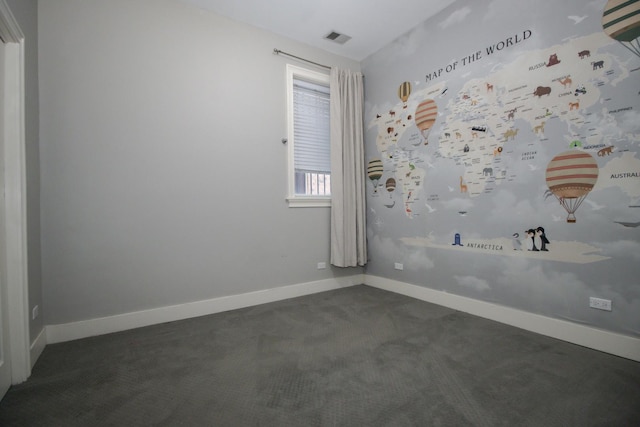 323 W Schiller St Unit 1W, Chicago, IL 60610 - empty room featuring dark colored carpet and baseboards