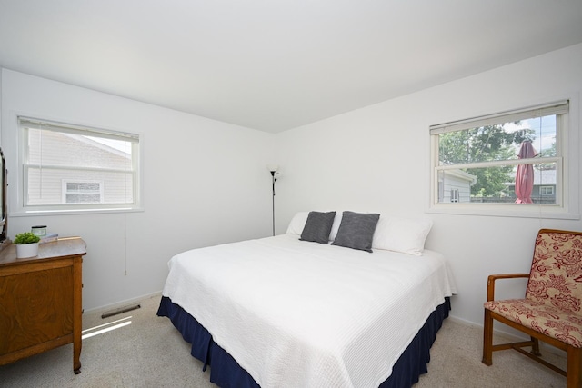 114 S Chestnut Dr, Streamwood, IL 60107 - bedroom with light colored carpet and baseboards