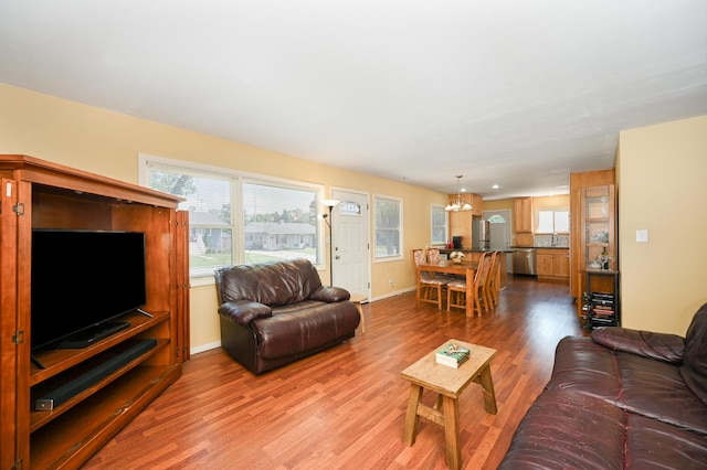 114 S Chestnut Dr, Streamwood, IL 60107 - living area with wood finished floors and a chandelier