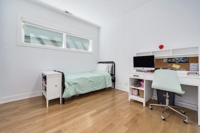 879 N Hermitage Ave Unit 2, Chicago, IL 60622 - bedroom featuring light wood finished floors and a desk