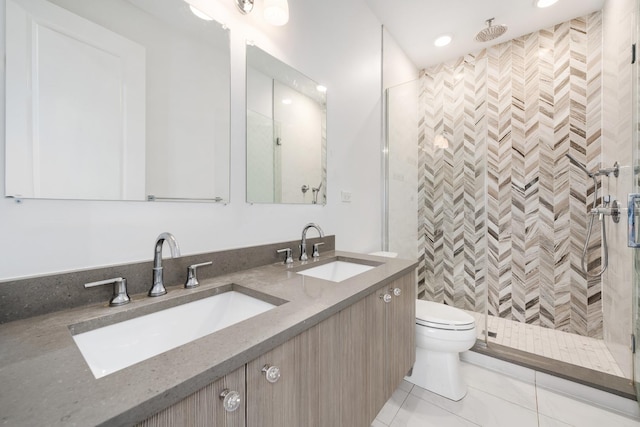 879 N Hermitage Ave Unit 2, Chicago, IL 60622 - bathroom featuring a stall shower, double vanity, recessed lighting, and tile patterned floors