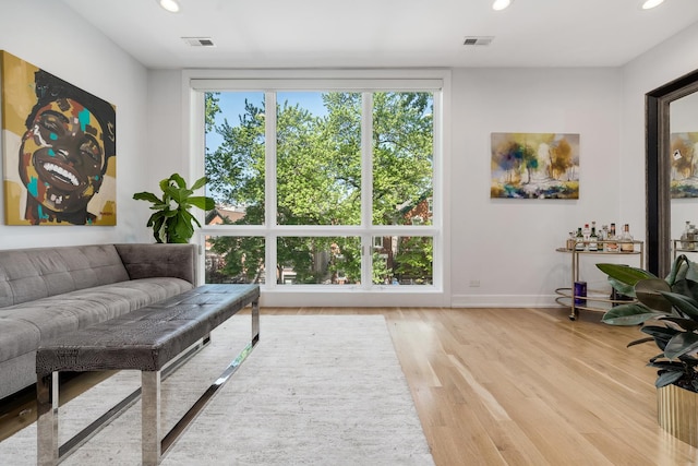879 N Hermitage Ave Unit 2, Chicago, IL 60622 - living room featuring recessed lighting, healthy amount of natural light, and wood finished floors