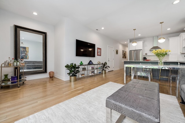 879 N Hermitage Ave Unit 2, Chicago, IL 60622 - living room featuring light wood finished floors and recessed lighting