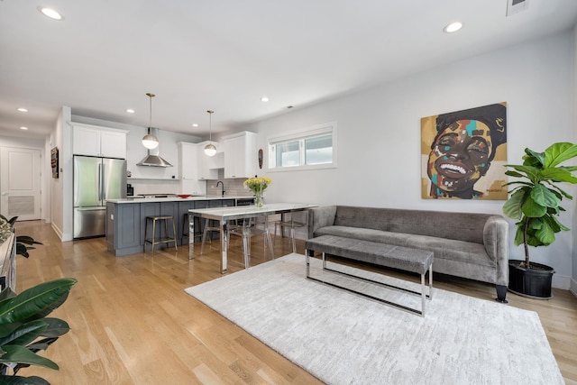 879 N Hermitage Ave Unit 2, Chicago, IL 60622 - living room with recessed lighting and light wood-style flooring