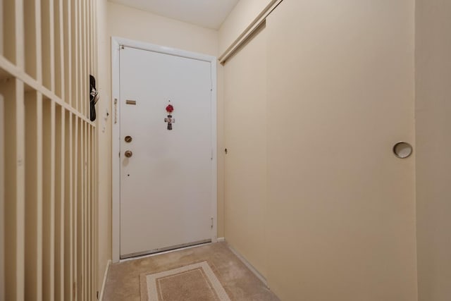 740 Saint Andrews Ln Unit 13, Crystal Lake, IL 60014 - doorway to outside with light colored carpet and baseboards