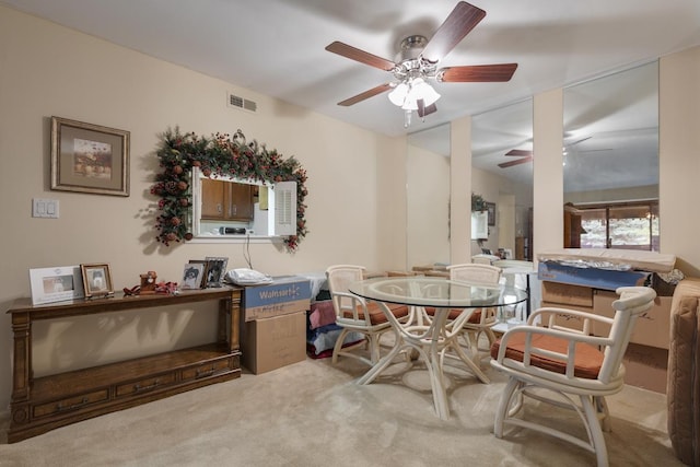 740 Saint Andrews Ln Unit 13, Crystal Lake, IL 60014 - dining space with ceiling fan and carpet floors