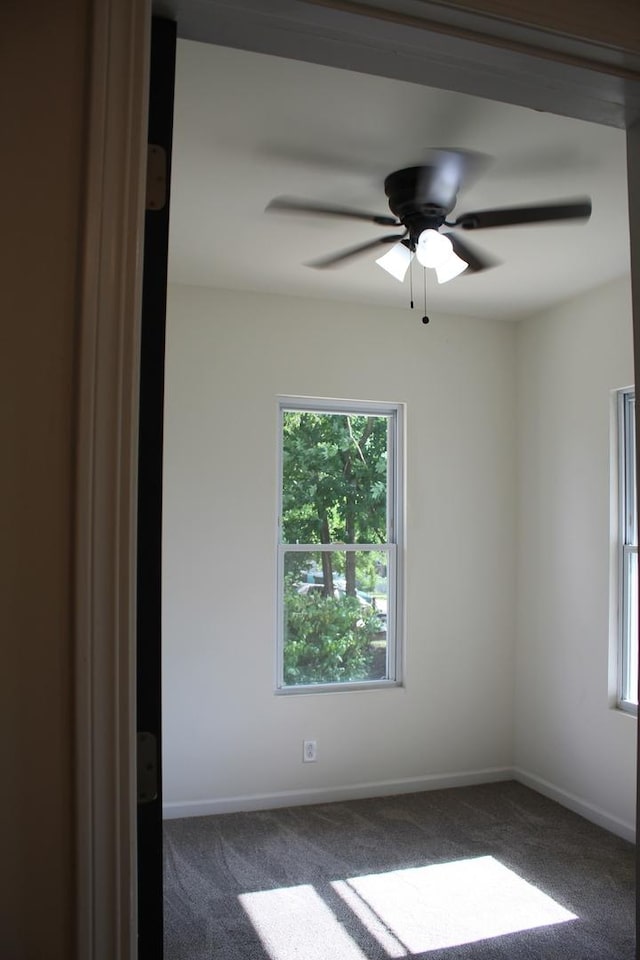 534 Mohawk St, Joliet, IL 60432 - carpeted empty room with ceiling fan and baseboards