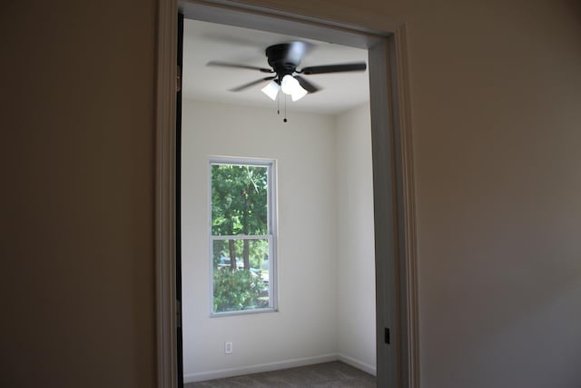 534 Mohawk St, Joliet, IL 60432 - empty room with carpet floors and a ceiling fan