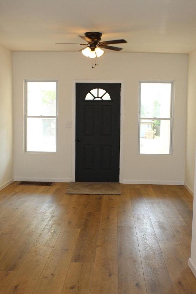 534 Mohawk St, Joliet, IL 60432 - foyer entrance featuring hardwood / wood-style floors and a ceiling fan
