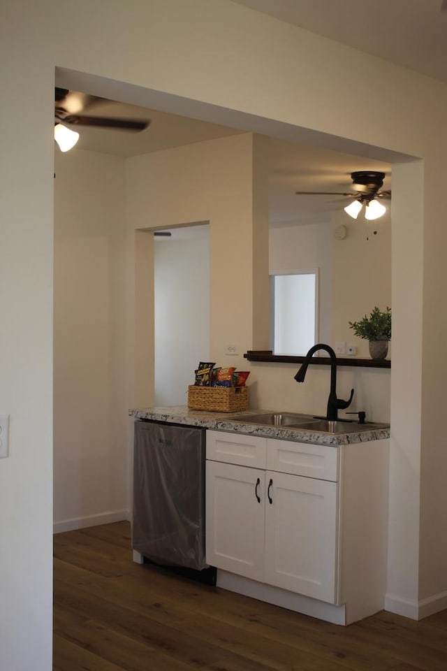 534 Mohawk St, Joliet, IL 60432 - kitchen featuring ceiling fan, dark wood-type flooring, white cabinets, and light stone counters