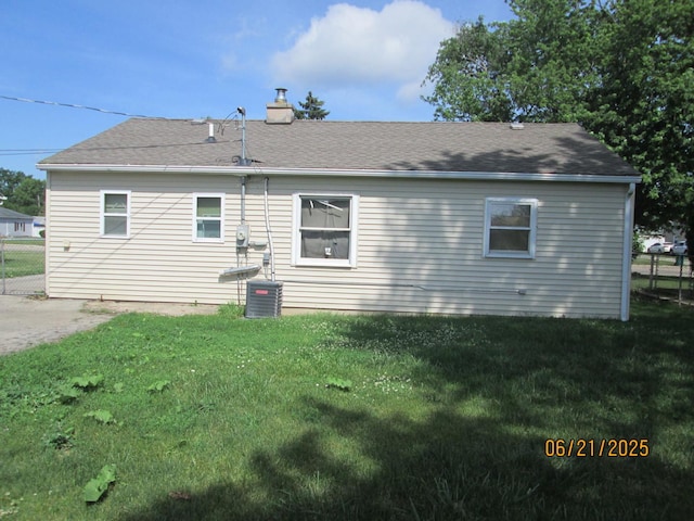 116 S Hammes Ave, Joliet, IL 60436 - back of house with a chimney and a shingled roof