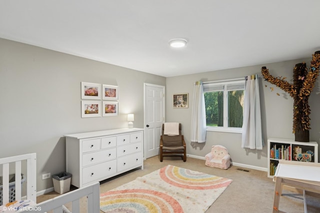 332 S Elmwood Ln, Palatine, IL 60067 - bedroom with light colored carpet and a crib