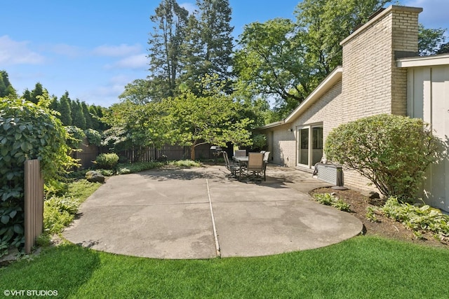 332 S Elmwood Ln, Palatine, IL 60067 - fenced backyard with a patio