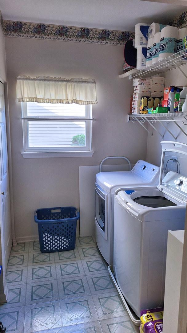 1437 Sage Dr, Bolingbrook, IL 60490 - laundry room with plenty of natural light and independent washer and dryer
