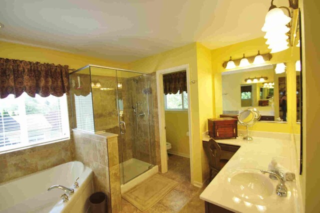 1437 Sage Dr, Bolingbrook, IL 60490 - full bath with double vanity, a bath, and a stall shower