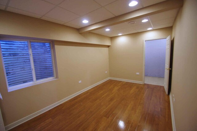 1437 Sage Dr, Bolingbrook, IL 60490 - empty room featuring wood finished floors, recessed lighting, and a paneled ceiling