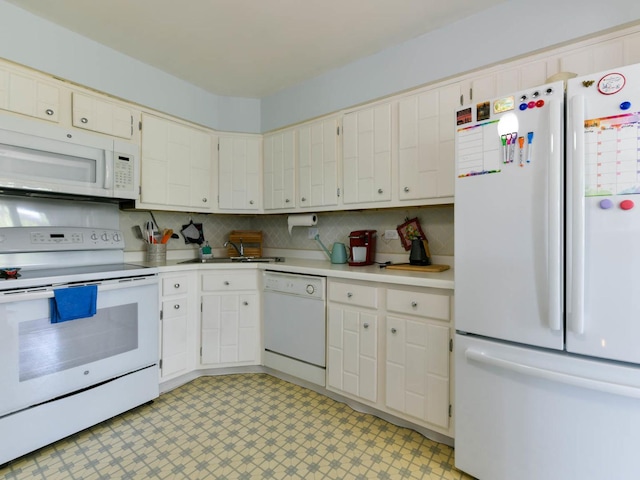 9395 Landings Ln Unit 406, Des Plaines, IL 60016 - kitchen featuring white appliances, light countertops, light floors, decorative backsplash, and white cabinetry