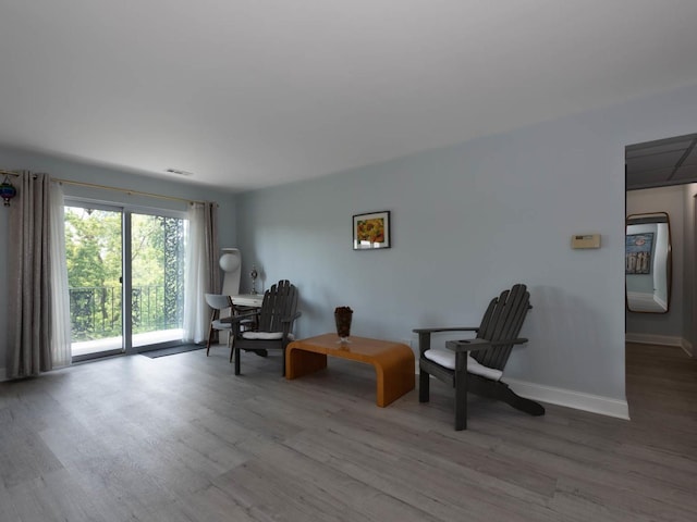 9395 Landings Ln Unit 406, Des Plaines, IL 60016 - living area with wood finished floors and baseboards