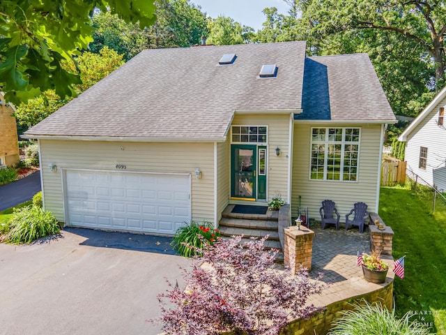 4091/2 Concord Ave, Fox River Grove, IL 60021 - view of front of property featuring asphalt driveway, a garage, and roof with shingles