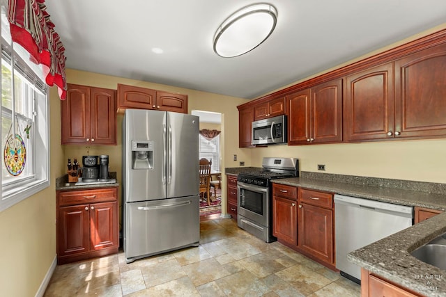 4091/2 Concord Ave, Fox River Grove, IL 60021 - kitchen featuring appliances with stainless steel finishes and dark stone countertops