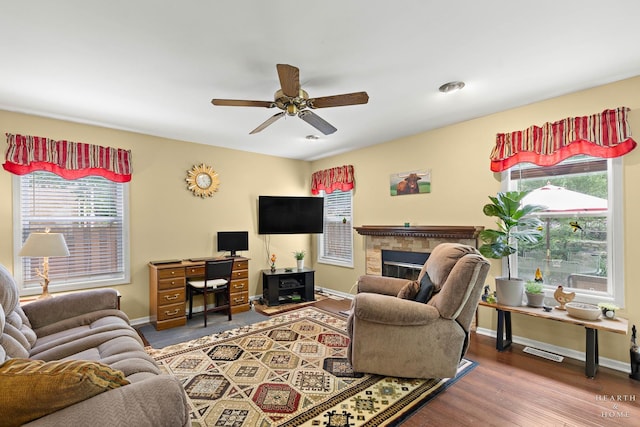 4091/2 Concord Ave, Fox River Grove, IL 60021 - living room with healthy amount of natural light, a ceiling fan, a fireplace, and wood finished floors