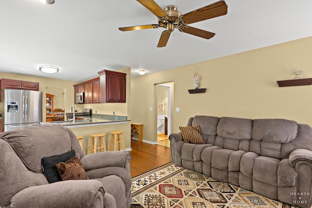 4091/2 Concord Ave, Fox River Grove, IL 60021 - living area with wood finished floors and ceiling fan