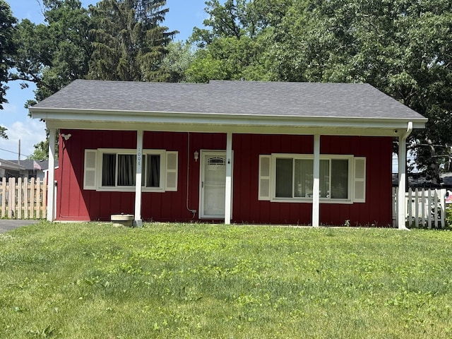 1006 Totem Trl, Mchenry, IL 60051 - view of front facade with board and batten siding, a shingled roof, and covered porch