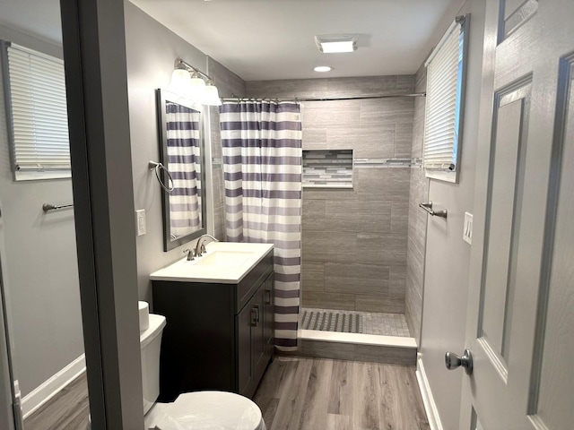 1006 Totem Trl, Mchenry, IL 60051 - full bath featuring vanity, wood finished floors, and a tile shower