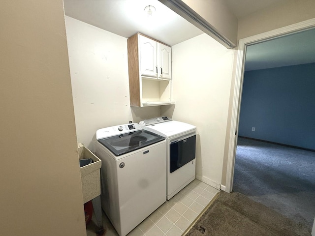 1006 Totem Trl, Mchenry, IL 60051 - laundry area with independent washer and dryer, cabinet space, light colored carpet, and light tile patterned flooring