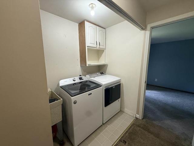 1006 Totem Trl, Mchenry, IL 60051 - laundry area featuring washer and dryer, cabinet space, light carpet, and light tile patterned floors