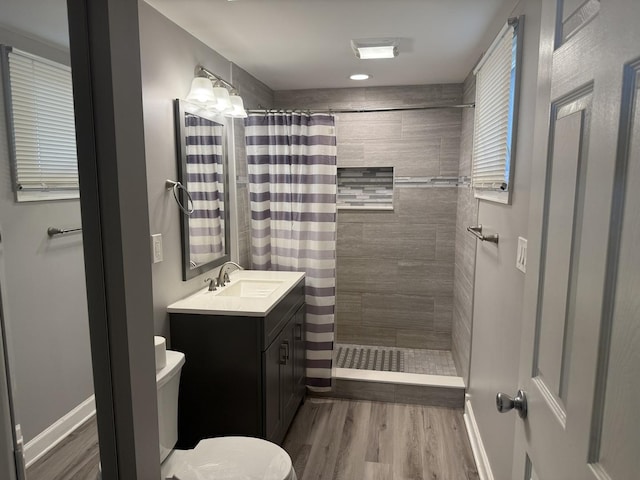 1006 Totem Trl, Mchenry, IL 60051 - bathroom with vanity, wood finished floors, and a tile shower