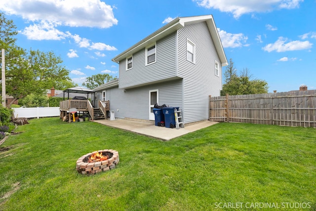 14 E Madison St, Villa Park, IL 60181 - back of house with a patio area, an outdoor fire pit, a fenced backyard, a gazebo, and a wooden deck