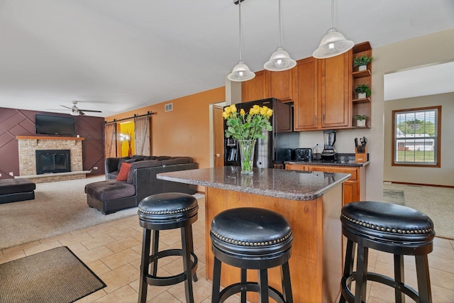 4218 Glenlo Dr, Plainfield, IL 60586 - kitchen with black fridge with ice dispenser, light colored carpet, open shelves, and ceiling fan