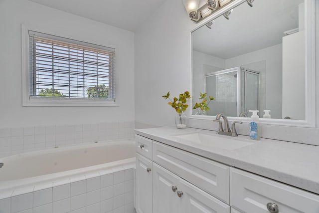 4218 Glenlo Dr, Plainfield, IL 60586 - bathroom featuring vanity, a garden tub, and a stall shower