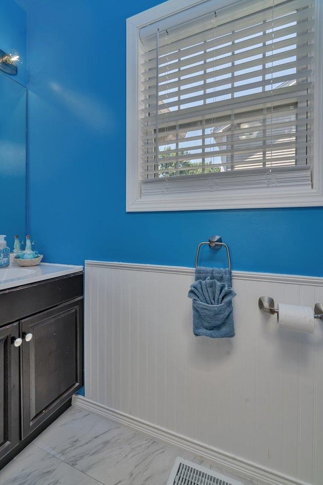 4218 Glenlo Dr, Plainfield, IL 60586 - bathroom with a wainscoted wall and vanity