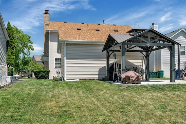 4218 Glenlo Dr, Plainfield, IL 60586 - back of property featuring a chimney, a gazebo, a yard, and roof with shingles