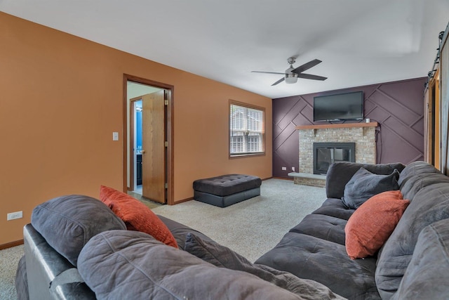 4218 Glenlo Dr, Plainfield, IL 60586 - living area with carpet, ceiling fan, a barn door, and a fireplace