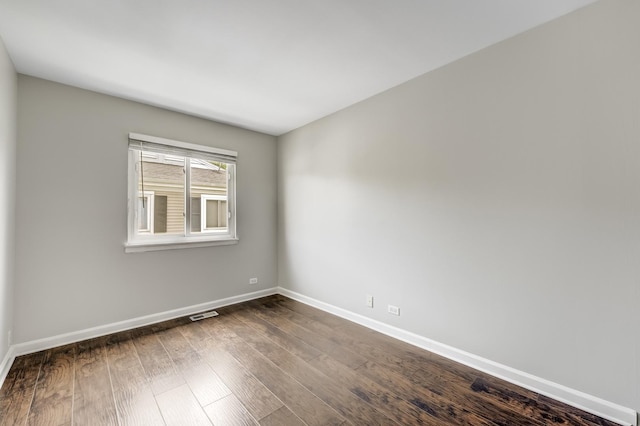 1558 Quaker Ln Unit 174D, Prospect Heights, IL 60070 - empty room with baseboards and dark wood-style flooring
