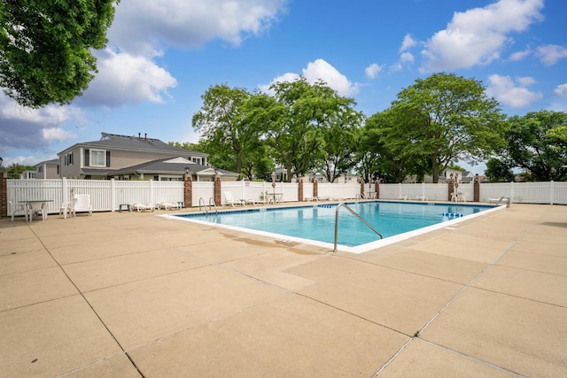 1558 Quaker Ln Unit 174D, Prospect Heights, IL 60070 - community pool featuring a patio