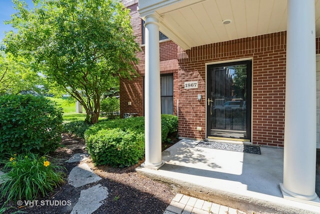 1867 Admiral Ct, Glenview, IL 60026 - view of exterior entry with brick siding and a porch