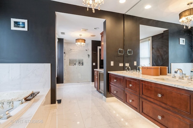 1867 Admiral Ct, Glenview, IL 60026 - bathroom featuring a chandelier, double vanity, a stall shower, marble finish flooring, and recessed lighting