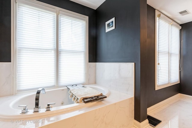1867 Admiral Ct, Glenview, IL 60026 - full bath with healthy amount of natural light, a jetted tub, and marble finish floors