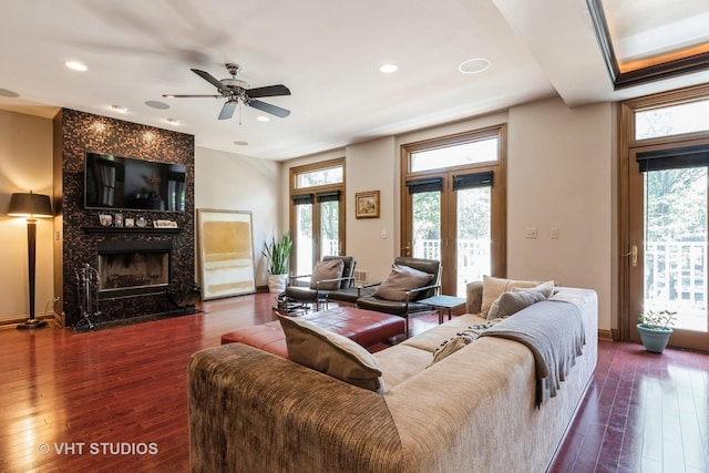 1867 Admiral Ct, Glenview, IL 60026 - living room with plenty of natural light, dark wood finished floors, ceiling fan, a fireplace, and recessed lighting