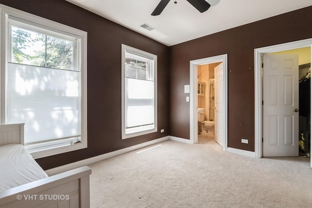 1867 Admiral Ct, Glenview, IL 60026 - unfurnished bedroom with light colored carpet, ensuite bath, and ceiling fan