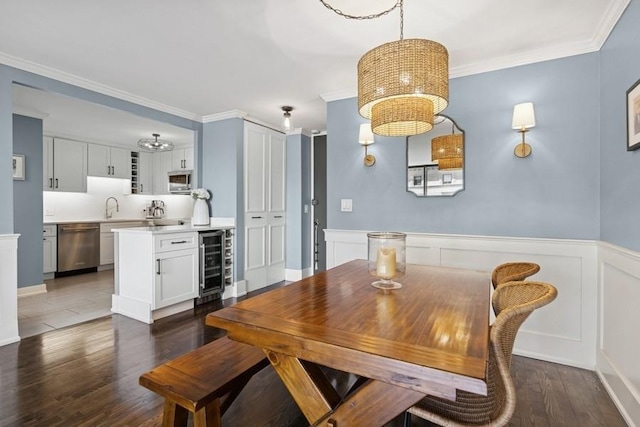 1450 N Astor St Unit 5C, Chicago, IL 60610 - dining room with beverage cooler, dark wood-style flooring, a wainscoted wall, and crown molding