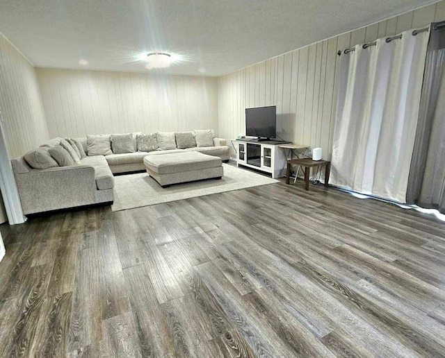 12416 W Prairie Dr, Homer Glen, IL 60491 - living area featuring dark wood finished floors, a textured ceiling, and wooden walls